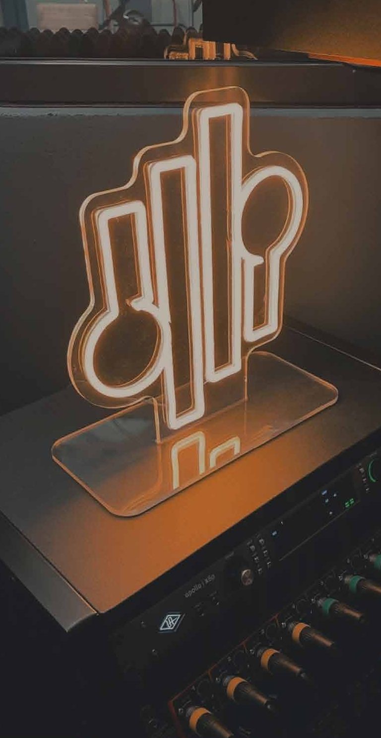 Brovah neon logo sign in the studio
